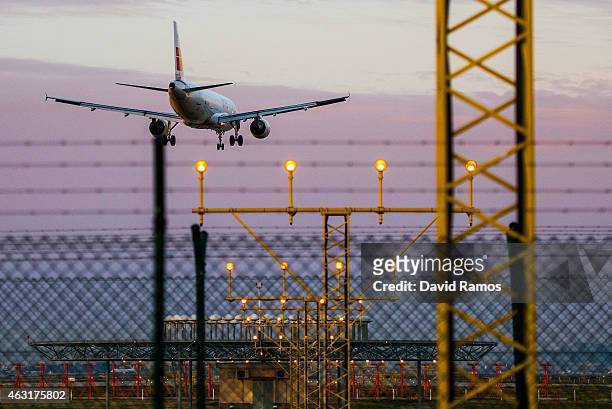 Plane operated by Iberia lands at Aena operated Barcelona - El Prat International Airport on February 11, 2015 in Barcelona, Spain. Shares in...