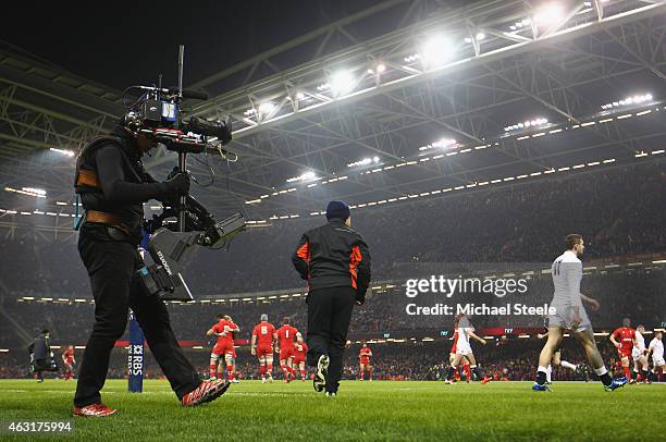 Television cameraman keeps a close eye on play during the RBS Six Nations match between Wales and England at the Millennium Stadium on February 6,...