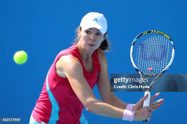 Galina Voskoboeva of Kazakhstan plays a backhand in her second round doubles match against Lucie Hradecka of the Czech Republic and Michaella...