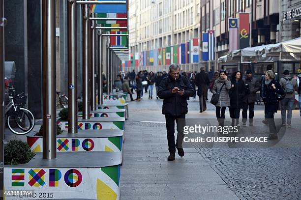 Logos of the Expo Milano 2015 are seen in a pedestrian street on February 11, 2015 in Milan where the World Exposition Milano 2015 will run from May...