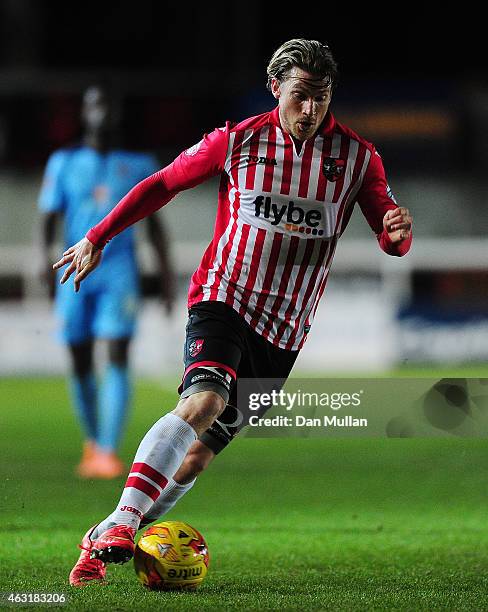 Christian Ribeiro of Exeter City in action during the Sky Bet League Two match between Exeter City and Cambridge United at St. James Park on February...
