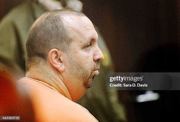 Craig Stephen Hicks sits in the Durham County courtroom for his first appearance in the shooting deaths of three University of North Carolina...