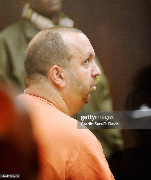 Craig Stephen Hicks sits in the Durham County courtroom for his first appearance in the shooting deaths of three University of North Carolina...