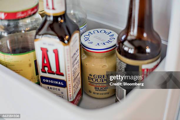 Kraft Foods Group Inc. A.1. Steak sauce and Grey Poupon dijon mustard are arranged for a photograph in Tiskilwa, Illinois, U.S., on Tuesday, Feb. 10,...