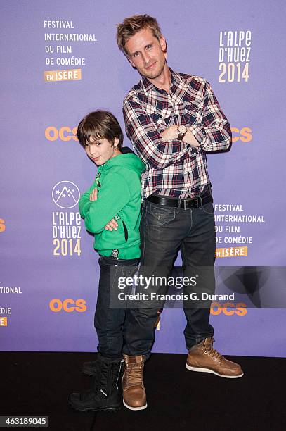 Philippe Lacheau and Enzo Tomasini pose during the 'Baby Sitting' - Photocall as part of the 17th L'Alpe D'Huez International Comedy Film Festival on...
