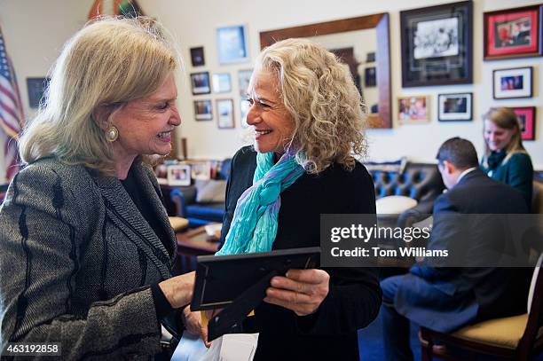 Musician and conservationist Carole King, right, and Rep. Carolyn Maloney, D-N.Y., talk before a news conference in Rayburn Building on the...