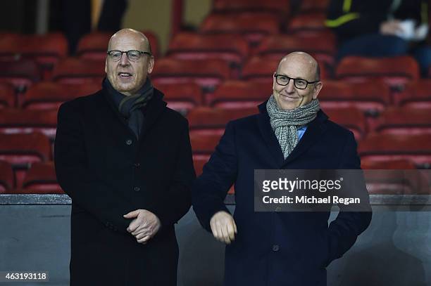 Avram Glazer and Joel Glazer, the Co-Chairmen of Manchester United look on during the Barclays Premier League match between Manchester United and...