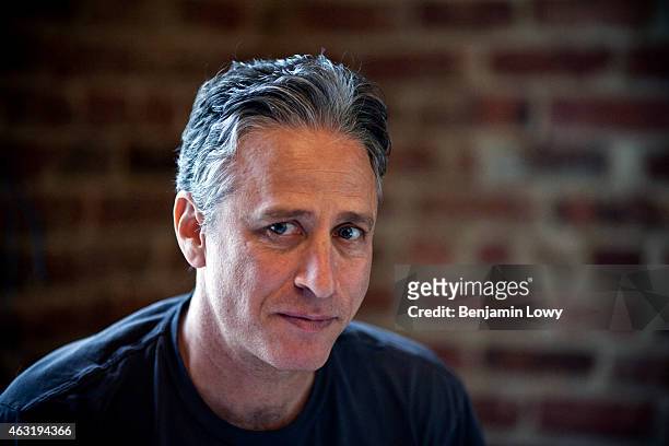 Comedian Jon Stewart, host of Comedy Central's The Daily Show, works in his office on August 9, 2011 in New York.