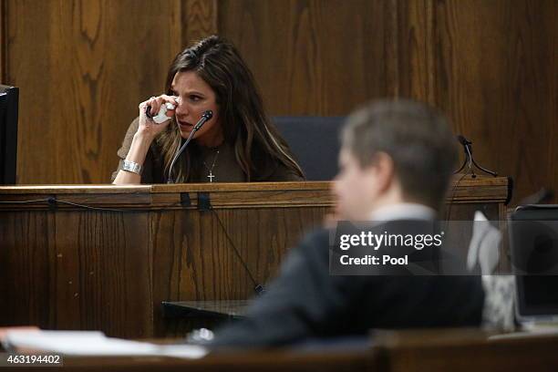 Taya Kyle, wife of slain Navy SEAL Chris Kyle, cries on the witness stand during the opening day of the capital murder trial of former Marine Cpl....