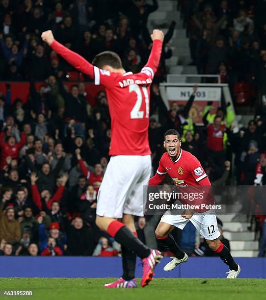 Chris Smalling of Manchester United celebrates scoring their second goal during the Barclays Premier League match between Manchester United and...