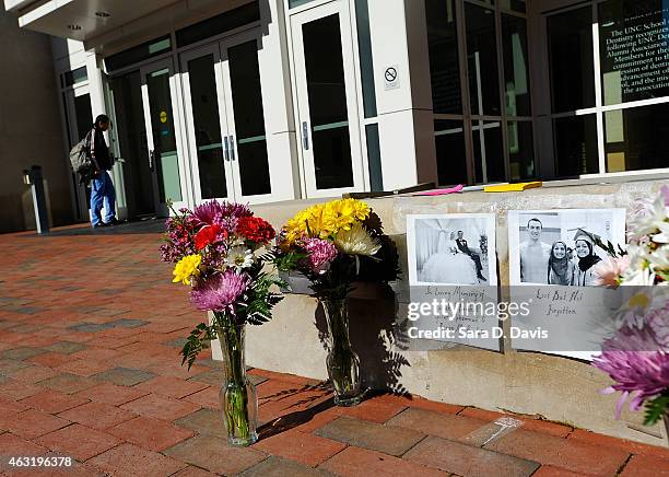 Flowers sit outside the University of North Carolina School of Dentistry in recognition of dentistry student Deah Shaddy Barakat his new wife Yusor...