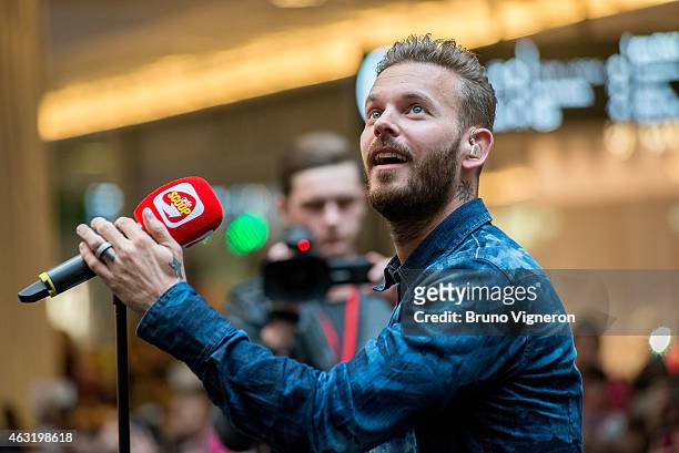 French singer Matt Pokora performs during a public showcase organized by Radio Scoop at Part-Dieu shopping center on February 11, 2015 in Lyon,...