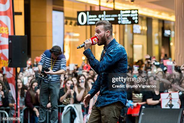 French singer Matt Pokora performs during a public showcase organized by Radio Scoop at Part-Dieu shopping center on February 11, 2015 in Lyon,...