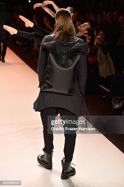 Model walks the runway at the Umasan show during Mercedes-Benz Fashion Week Autumn/Winter 2014/15 at Brandenburg Gate on January 17, 2014 in Berlin,...