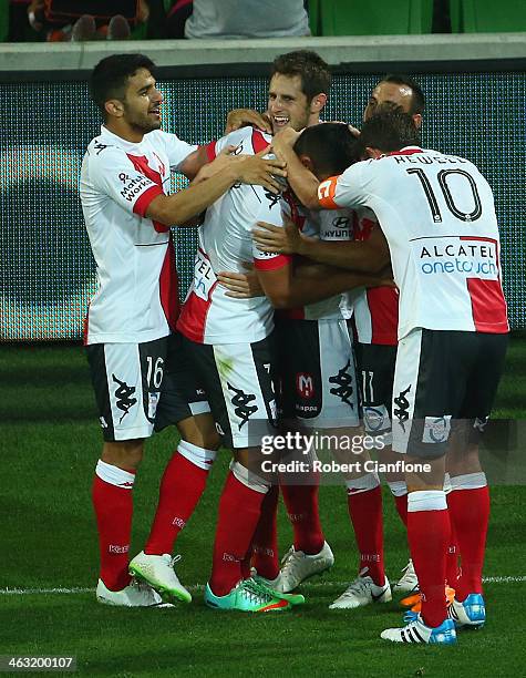 Mate Dugandzic of the Heart celebrates his second goal with team mates during the round 15 A-League match between Melbourne Heart and the Newcastle...