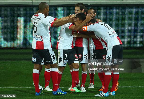 Mate Dugandzic of the Heart celebrates his second goal with team mates during the round 15 A-League match between Melbourne Heart and the Newcastle...