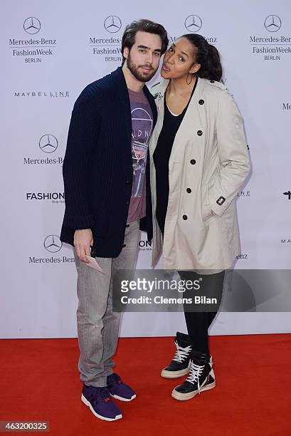Stephan Kocijan and Cassandra Steen attend the Umasan show during Mercedes-Benz Fashion Week Autumn/Winter 2014/15 at Brandenburg Gate on January 17,...