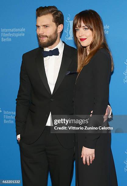 Jamie Dornan and Dakota Johnson attend the 'Fifty Shades of Grey' premiere during the 65th Berlinale International Film Festival at Zoo Palast on...