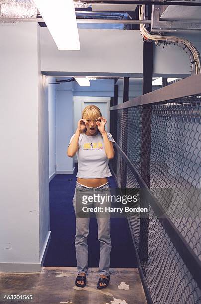 Radio presenter Sara Cox is photographed by the Observer on June 5, 2001 in London, England.