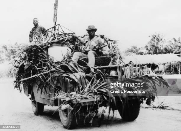 Government troops riding on a camouflaged Land Rover in a search for rebel troops of the breakaway region of Biafra, during the Nigerian Civil War,...