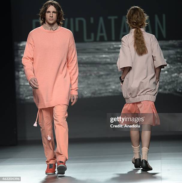 Models present the creation of David Catalan during the Mercedes Benz Fashion Week Madrid at IFEMA on February 11, 2015 in Madrid, Spain.