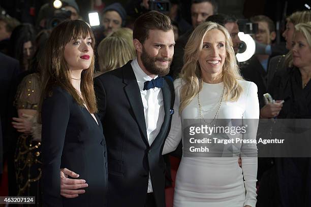 Actress Dakota Johnson, actor Jamie Dornan and director Sam Taylor-Johnson attend the 'Fifty Shades of Grey' premiere during the 65th Berlinale...