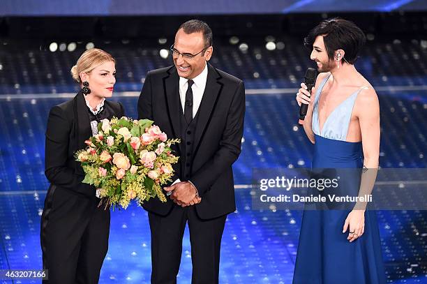 Carlo Conti, Emma Marrone and Conchita Wurst attend second night 65th Festival di Sanremo 2015 at Teatro Ariston on February 11, 2015 in Sanremo,...