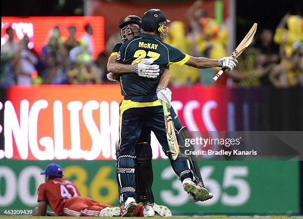 James Faulkner and Clint McKay of Australia celebrate victory after the second game of the One Day International Series between Australia and England...