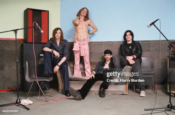 Glam rock band The Darkness are photographed for Trash on May 6, 2003 in London, England.