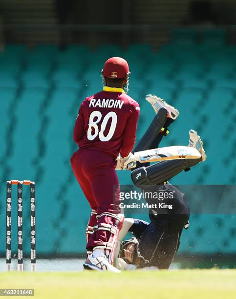 Wicketkeeper Matthew Cross of Scotland dives as Denesh Ramdin of West Indies bats during the ICC Cricket World Cup warm up match between the West...