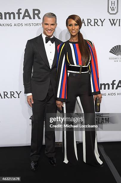 Jay Manuel and Iman attend the 2015 amfAR New York Gala at Cipriani Wall Street on February 11, 2015 in New York City.