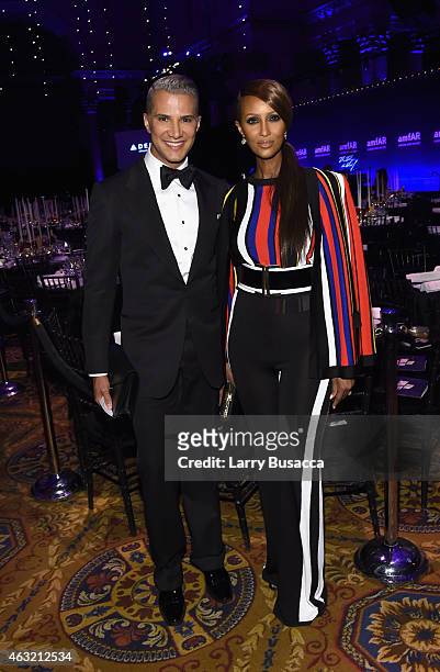 Jay Manuel and Iman attend the 2015 amfAR New York Gala at Cipriani Wall Street on February 11, 2015 in New York City.