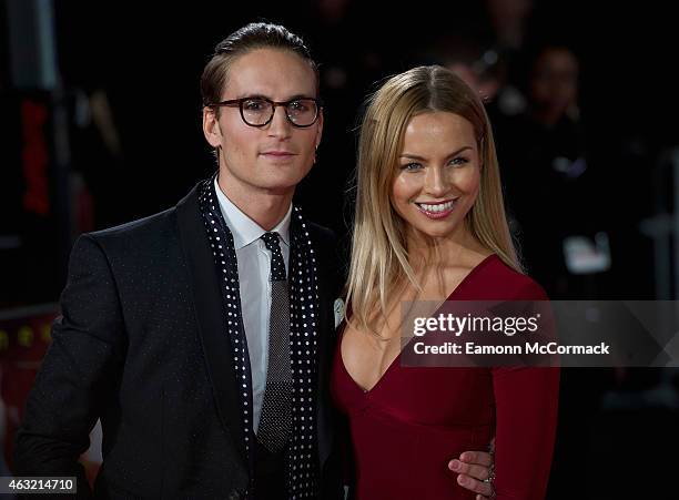 Oliver Proudlock and Emma Louise Connolly attend a special screening of "Focus" at Vue West End on February 11, 2015 in London, England.