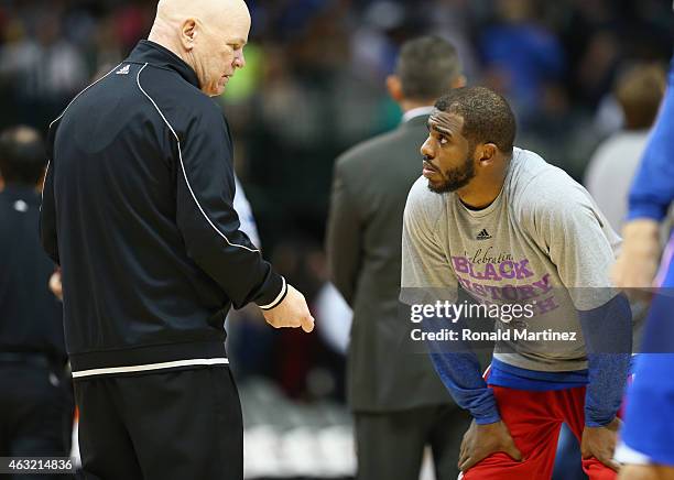 Referee Joe Crawford talks with Chris Paul of the Los Angeles Clippers at American Airlines Center on February 9, 2015 in Dallas, Texas. NOTE TO...