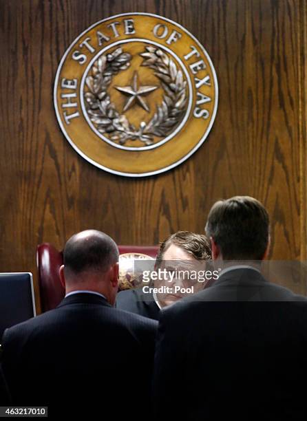 State District Judge Jason Cashon listens to arguments from Erath County District Attorney Alan Nash and court appointed defense attorney R. Shay...