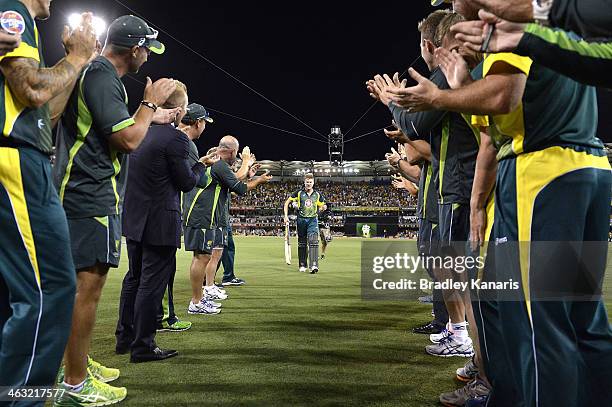 James Faulkner of Australia is cheered off by team mates after hitting the winning runs after during the second game of the One Day International...