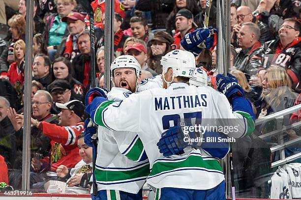 Zack Kassian of the Vancouver Canucks reacts after scoring against the Chicago Blackhawks in the second period during the NHL game at the United...