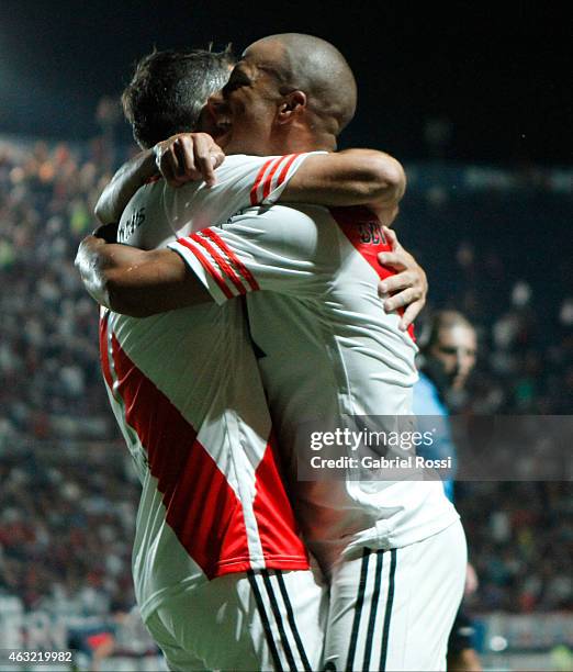 Carlos Sanchez of River Plate celebrates with his teammate after scoring the first goal of his team during a second leg match between San Lorenzo and...