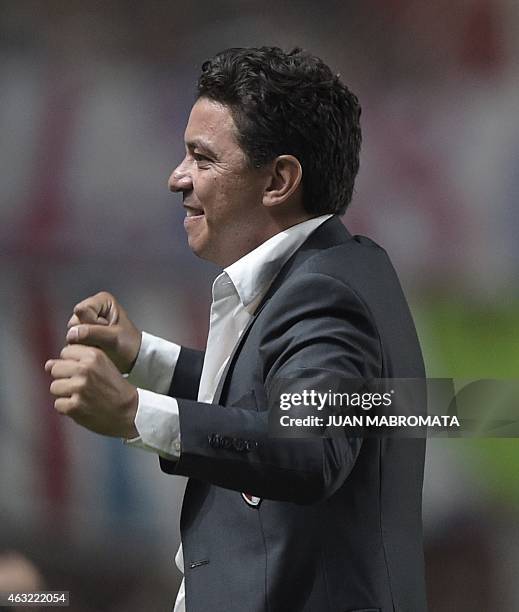 River Plate's coach Marcelo Gallardo celebrates after their 1-0 victory in the Recopa Sudamericana 2015 second final football match against San...