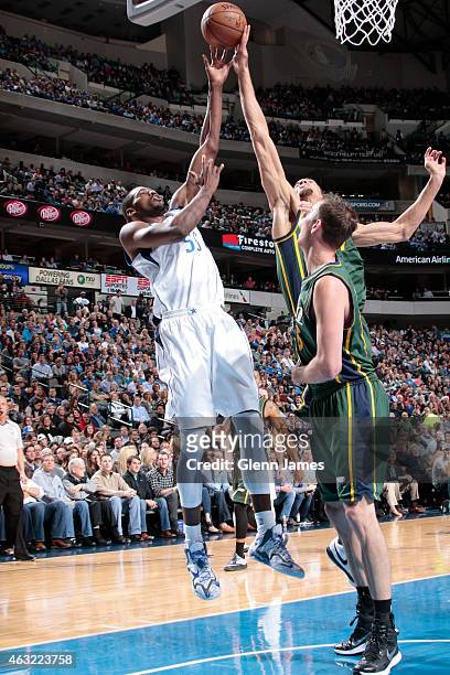 Bernard James of the Dallas Mavericks goes in for a layup against the Utah Jazz on February 11, 2015 at the American Airlines Center in Dallas,...