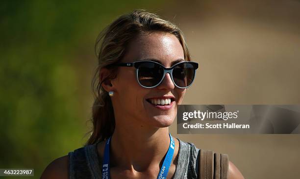 Katharina Boehm follows the play of Sergio Garcia of Spain during the second round of the Abu Dhabi HSBC Golf Championship at the Abu Dhabi Golf...