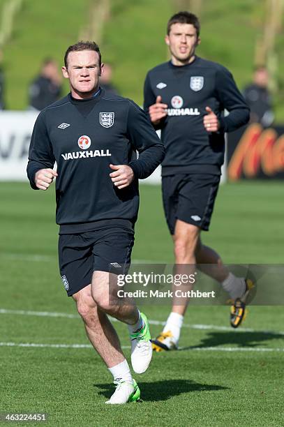 Wayne Rooney and Michael Carrick during a visit by Prince William, Duke of Cambridge and Catherine, Duchess of Cambridge at the official launch of...