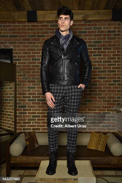 Model poses at the Gilded Age presentation at Mercedes-Benz Fashion Week Fall 2015 on February 11, 2015 in New York City.