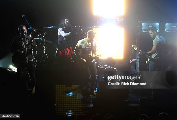 Caleb, Nathan, Matthew, and Jared Followill of Kings of Leon perform at the Sports Illustrated 2015 Swimsuit Takes Over The Schermerhorn Symphony...