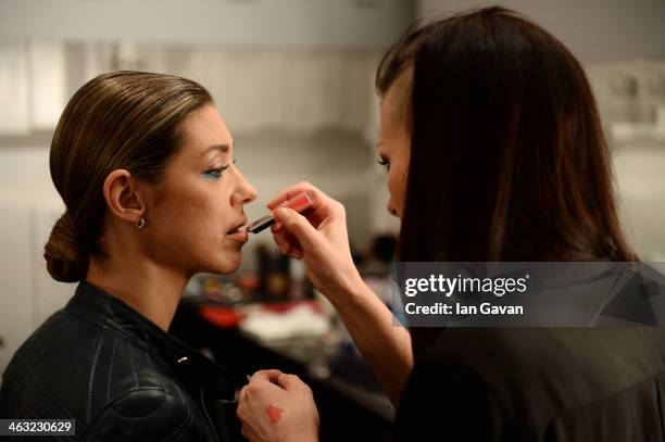 Models are seen backstage ahead of the Miranda Konstantinidou show during Mercedes-Benz Fashion Week Autumn/Winter 2014/15 at Brandenburg Gate on...