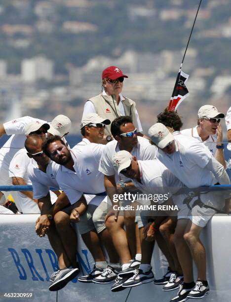 Spain's King Juan Carlos I sails on board of the ship Bribon on the second day of the Copa del Rey regatta in Palma de Mallorca on August 04, 2009....