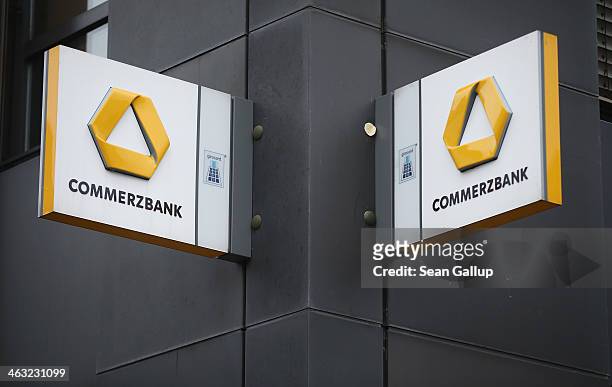 The logo of Commerzbank bank hangs at a branch on January 17, 2014 in Berlin, Germany. Banks across Europe will be announcing their financial results...