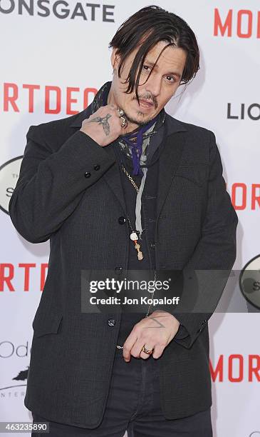 Actor Johnny Depp arrives at the Los Angeles Premiere Of "Mortdecai" at TCL Chinese Theatre on January 21, 2015 in Hollywood, California.