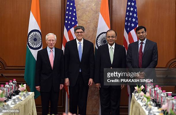 Indian Finance Minister Arun Jaitley and US Secretary of Treasury Jacob J. Lew pose with Vice Chairman of Federal Board of Governors Stanley Fisher...