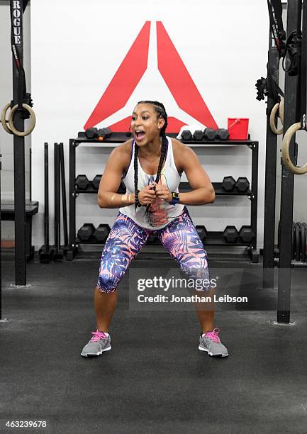 Lita Lewis attends the Reebok Seeding Lounge Workout with French Montana, Lita Lewis And DJ Drama at Reebok Lounge on February 11, 2015 in West...